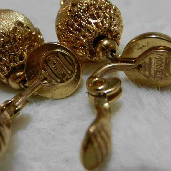 Vintage signed Monet Clip on Globe Golden Earings Filigree  VTG MONET gold clip earrings filigree mesh gold tone globe drop and dangle glam